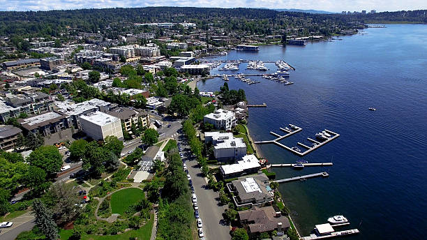 Shoreline WA waterfront with docks, boats, and buildings by the sea.