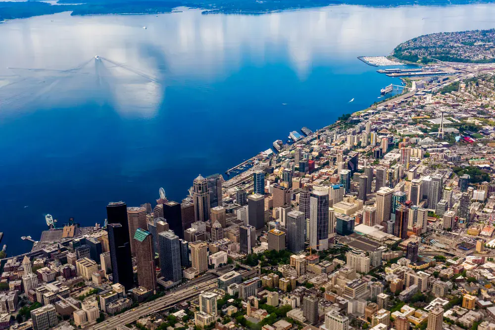 Aerial view of Seattle, WA, with waterfront and skyline.