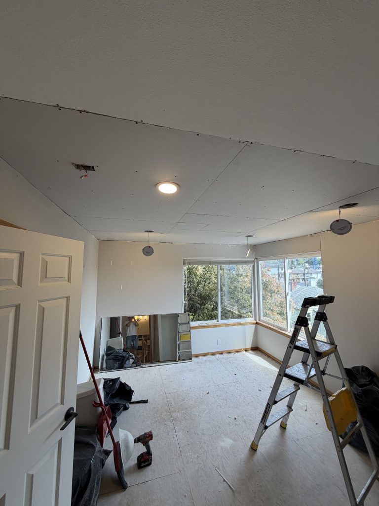 Finished living room with new recessed LED lighting
