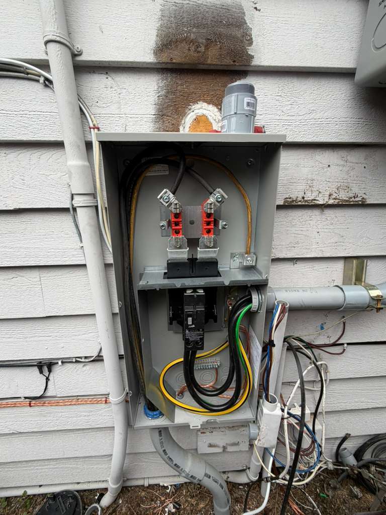 New meter base wired during a battery backup installation in Redmond, WA